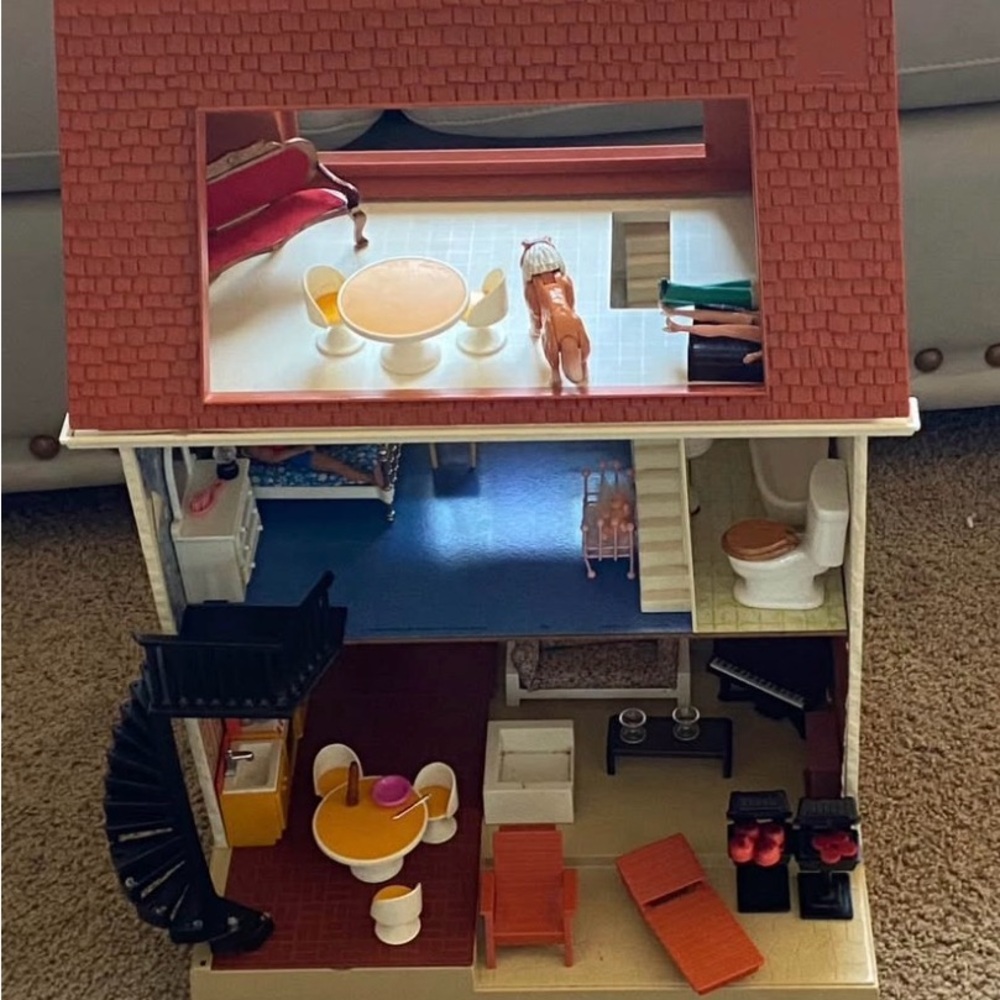 Vintage 1970 Fisher-Price Dollhouse with furniture and characters